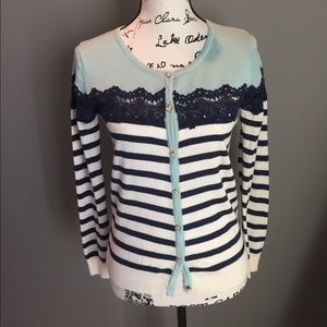 Size Small stripped sweater. Brand: Stone Flower